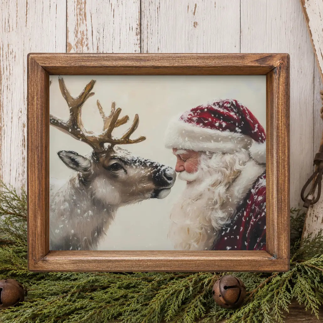 Reindeer and Santa Eskimo Kisses Framed Print