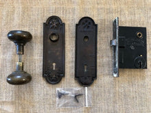 Load image into Gallery viewer, Antique Stamped Brass Sargent &amp; Co Doorknob Set
