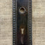 Antique Stamped Egg-and Dart Doorknob Plate with Escutcheon - 6½"
