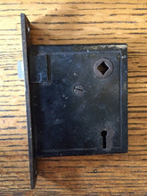 Load image into Gallery viewer, Antique The M.F.G Co. Steel Interior Mortise Door Lock right side
