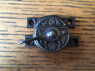 Antique Daisy Cast Iron Window Sash Lock - 2¾" front