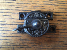 Load image into Gallery viewer, Antique Daisy Cast Iron Window Sash Lock - 2¾&quot;
